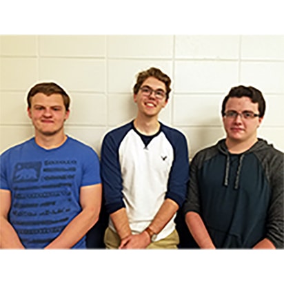 Jeffery Whitmire, Ethan Taylor, and Gavin Meeker smiling for portrait