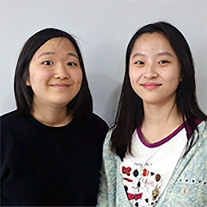 SooMin Hwangbo and Faith Moon Hwang smiling for portrait