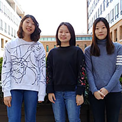 Sarah Lee, Crystal Lim, and Rachel Hong smiling for portrait